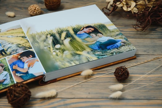 premium photo book, large size, natural wood cover, quality binding. Family photobook, recreation memories