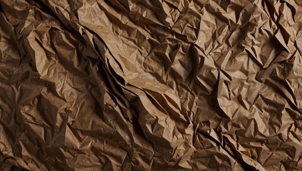 Brown wrinkle recycle paper background for Design Blank surface for text or work. photo