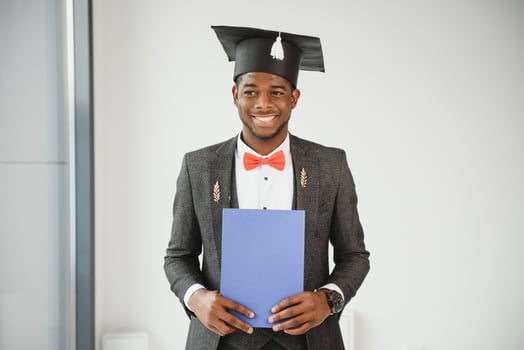 Portrait Of Graduation Man With Diploma. photo