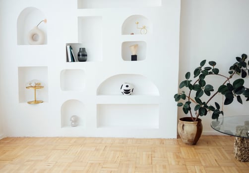 Modern bright interior of living room with white wall and niches. photo