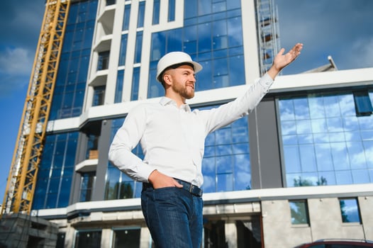 Industrial theme constructor standing at a site area. photo