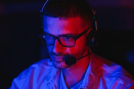 Gamer playing a first person shooter on high end pc. photo