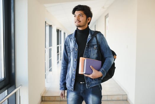 Handsome and young indian Male college student. photo