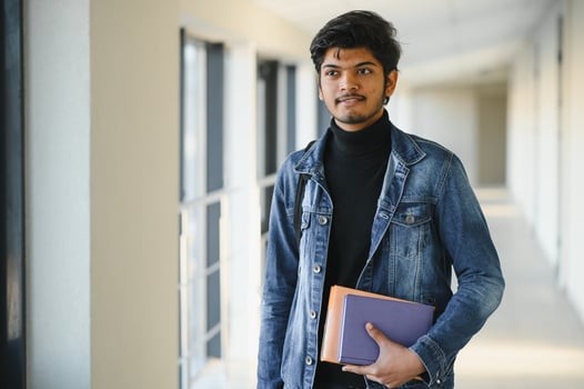 Handsome and young indian Male college student. photo