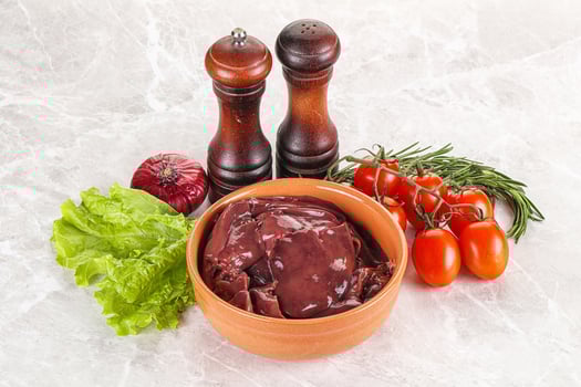 Raw turkey liver in a bowl ready for cooking photo