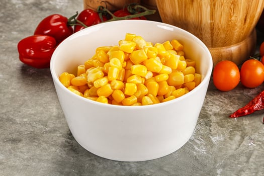 Sweet canned ripe corn grain photo