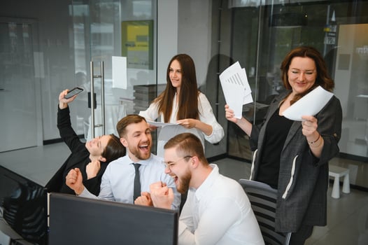 Group of businessmen and businesswomen stock brokers working at office. photo