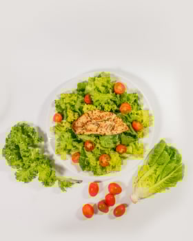 Salad with Tomato and Pan Fried Dory Composition photo