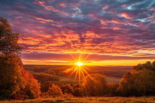 A breathtaking sunset over an autumn landscape. photo