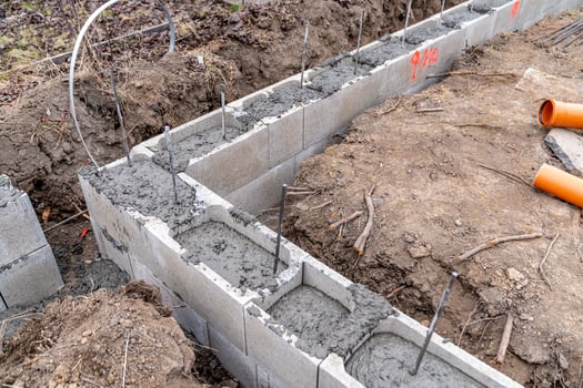 concreting of the foundation of a new building at the construction site photo