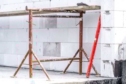 scaffolding on the construction of a house during the construction of a wall photo
