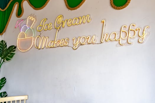 Ice Cream Sign Makes You Happy Neon on the Wall photo