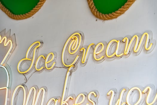 Ice Cream Sign Makes You Happy Neon on the Wall photo