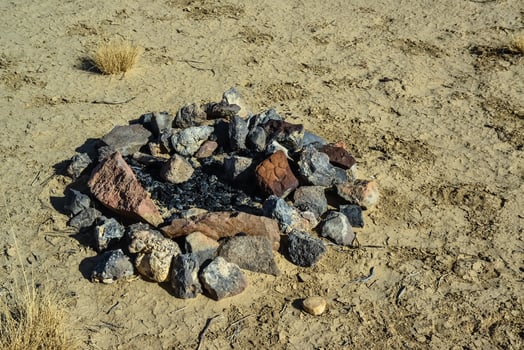 Old Native American Desert Stone Bonfire in New Mexico photo