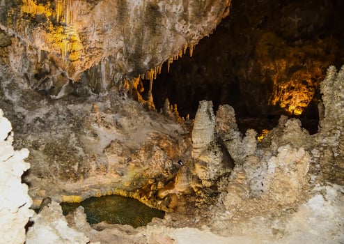 Calcite inlets, stalactites and stalagmites in large underground halls in Carlsbad Caverns National Park, New Mexico. USA photo