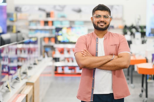 Indian man in an electronics store photo