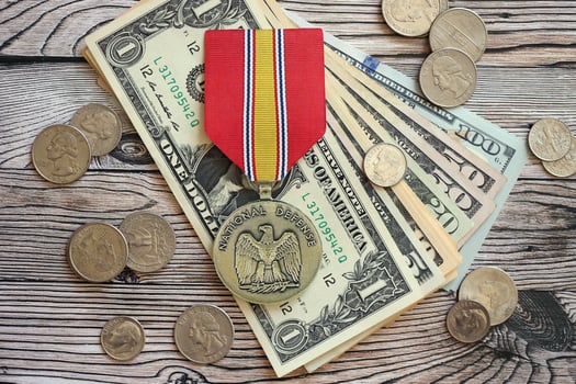 KYIV, UKRAINE - JULY 10, 2024 National Defense General Service medal. United States military award medal with ribbon and pin. Handmade paper theater props photo