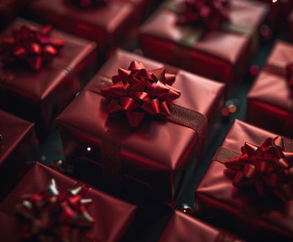 Luxurious gift boxes with pink ribbons and bows. photo