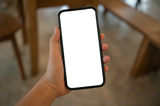 Cropped shot view of Women's hands holding cell telephone blank copy space screen. smart phone with technology concept photo