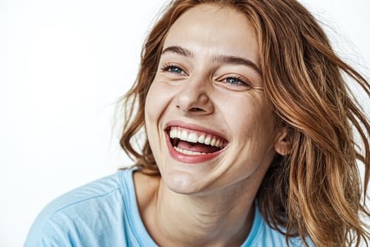 Young woman laughing with joy, portrait photo