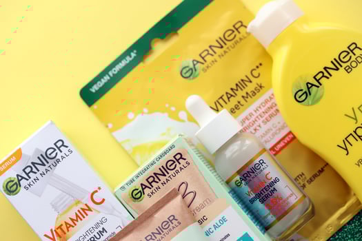 KYIV, UKRAINE - APRIL 20, 2024 Garnier production with company logo. Garnier is a mass market cosmetics brand of French cosmetics company L'Oreal photo