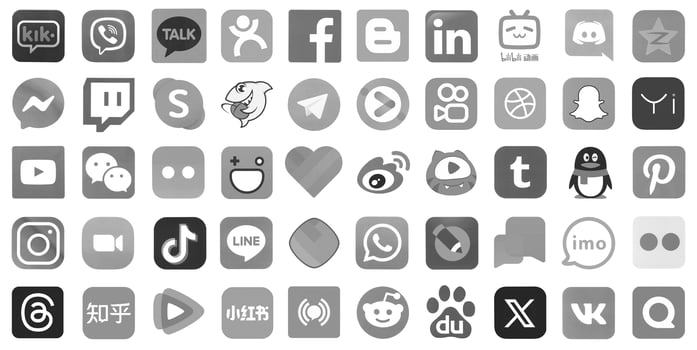 KYIV, UKRAINE - APRIL 1, 2024 Many icons of social media, messengers, sharing platforms photo