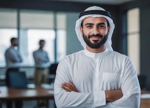 Portrait of an Arab man on a modern office background. photo