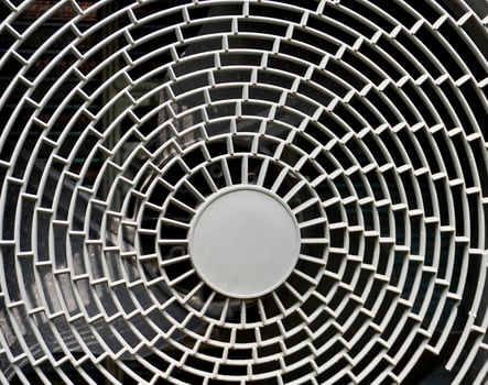 Close up gray outdoor air conditioner exhaust fan texture isolated on horizontal full frame background. photo
