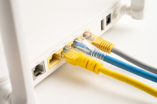 Ethernet cable with wireless router connect to internet service provider internet network. photo