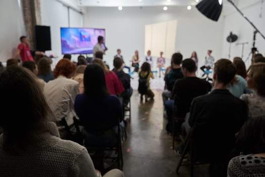 Speakers make a presentation at a corporate business conference. Unrecognizable people in the audience of the conference hall. Business and Entrepreneurship Event photo