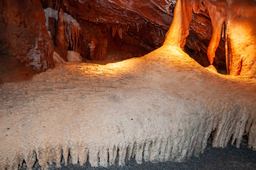 Calcite inlets, stalactites and stalagmites in large underground halls in Carlsbad Caverns NP, New Mexico photo