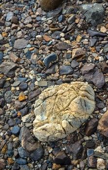 Sun-scorched, lifeless, stony, dry desert in the foothills of California photo