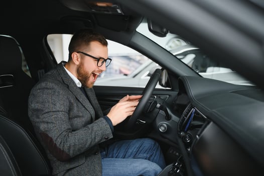 Man adult customer male buyer client wears classic suit white shirt chooses auto wants to buy new automobile photo