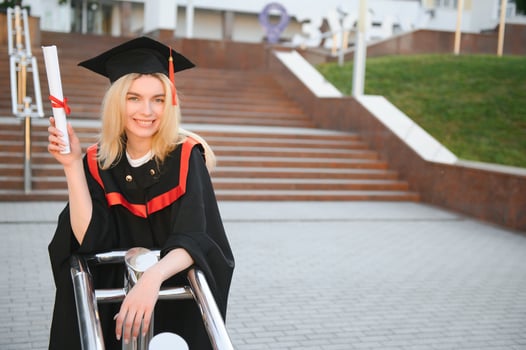 Portrait of a happy woman on her graduation day at university. Education and people. photo