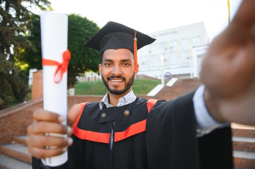 indian male graduate taking selfie photo