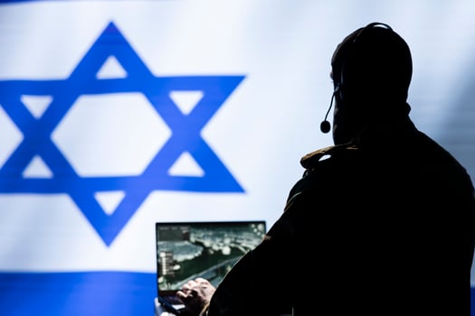 Communication systems operator working for Mossad using radio and satellite equipment, providing combat support. Israeli military dispatcher managing broadcasting networks, Israel flag photo