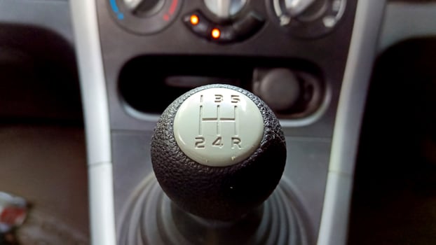 View of black manual car gear shift photo