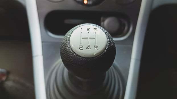 View of black manual car gear shift photo