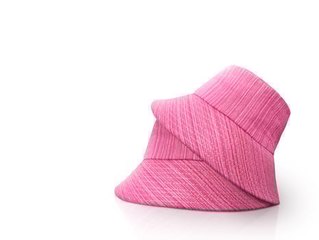 Two red bucket hats on a white background. photo