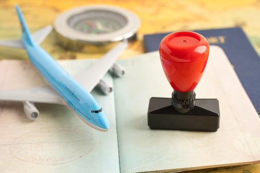 Approved Stamp visa and passport document to immigration at airport in country. photo