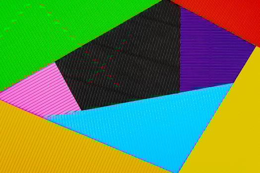 Colored background of corrugated paper. Soft focus. Copy space. photo