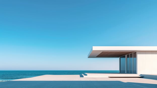 A sleek architectural marvel juxtaposed against the tranquil ocean horizon photo