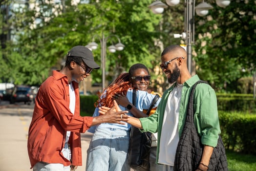Happy bunch of friends students share smiles hugs handshakes come together to hang out enjoy company photo