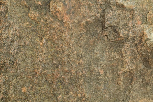 Abstract natural rock stone granite grunge rusty metal texture design background natural color stone material granite design wallpaper. Close-up detail of natural stone photo