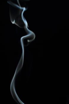 Abstract white smoke texture moves on black background Plume of smoke wave design wallpaper. Design element. Abstract texture photo