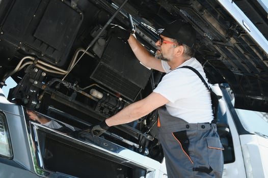 Portrait of professional truck mechanic photo