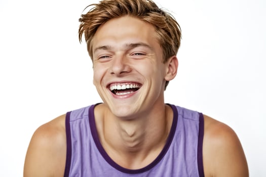 Portrait of a Young Man Smiling with White Teeth photo