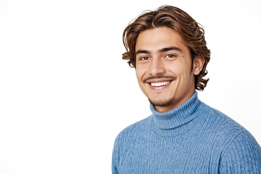 Handsome young man smiling with a white background photo