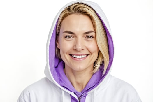 Smiling woman wearing a white hoodie with a purple lining photo