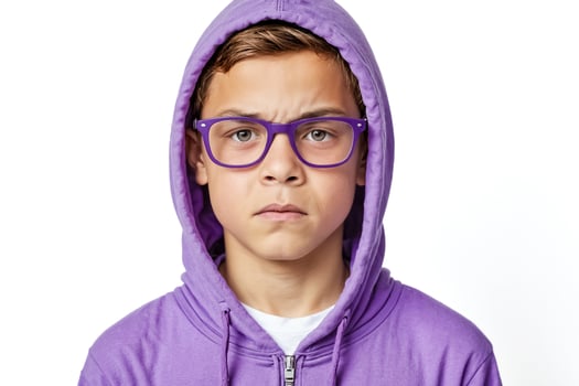 Portrait of a young boy in a purple hoodie photo